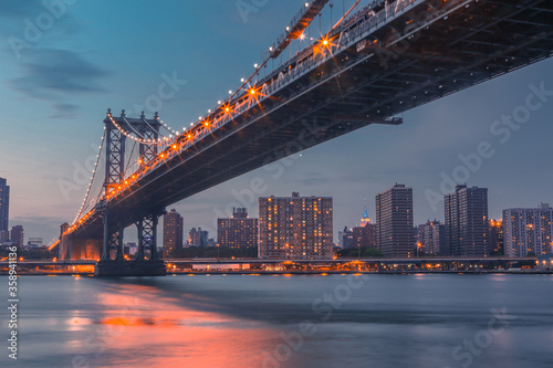 Manhattan Bridge and City Skyline at sunset © Zimu