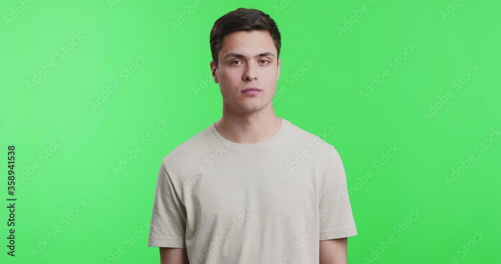 Young guy looking aside to the left and to the right