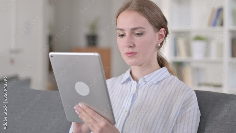 Portrait of Attractive Young Woman using Tablet Portrait of Attractive Young Woman using Tablet