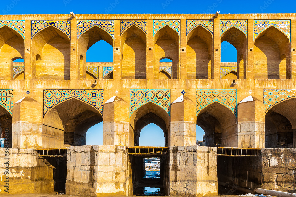 It's Khaju Bridge, arguably the finest bridge in the province of Isfahan, Iran. It was built by the Persian Safavid king, Shah Abbas II, around 1650 C.E.