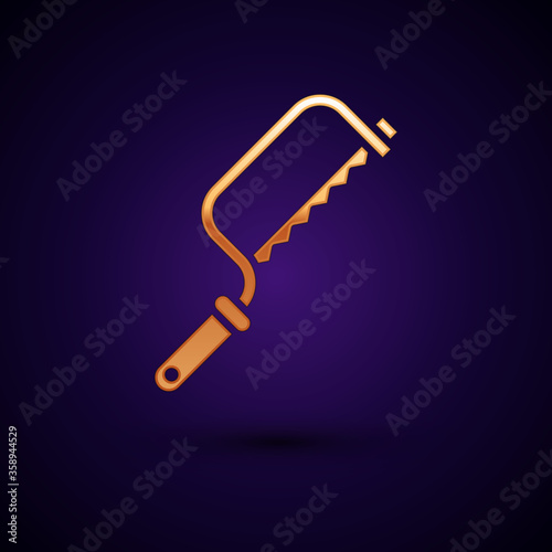 Gold Hacksaw icon isolated on black background. Metal saw for wood and metal. Vector Illustration.