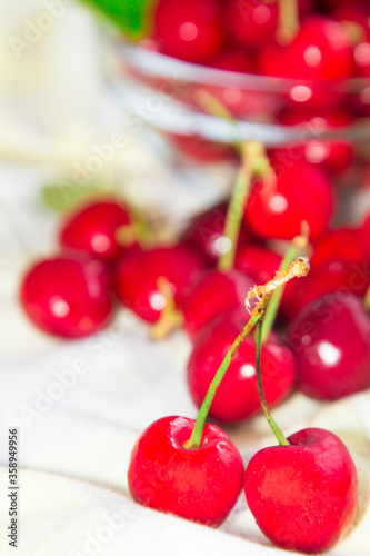 delicious red cherries in background