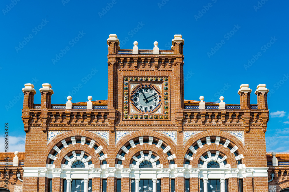 It's Railway station of RENFE in Aranjuez, Spain. RENFE is the main railway operator in Spain.