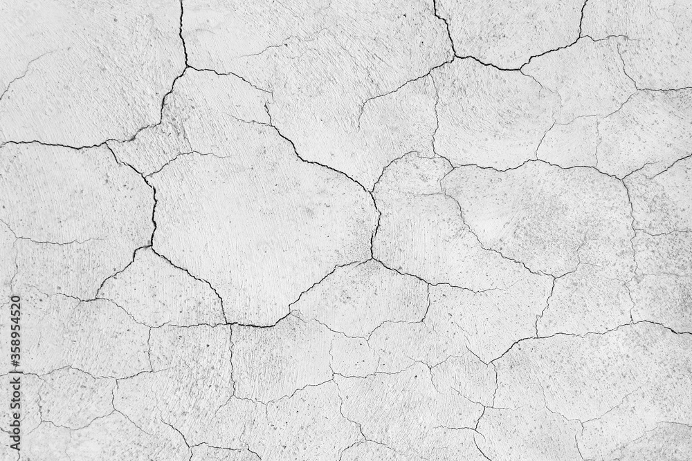 Old plaster wall crack surface for texture or backgrounds Old plaster wall crack surface for texture or backgrounds