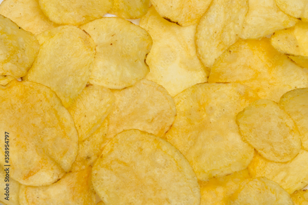 background of fried potato chips background of fried potato chips