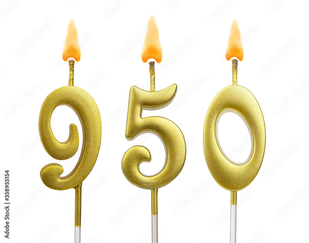 Golden birthday candles on white background, number 950 Golden birthday candles on white background, number 950