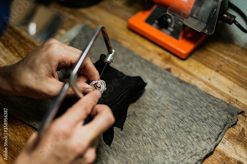 close-up. The jeweler makes a silver ring. On the island of Bali. Indonesia