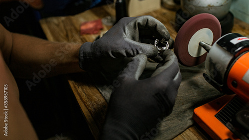 close-up. The jeweler makes a silver ring. On the island of Bali. Indonesia