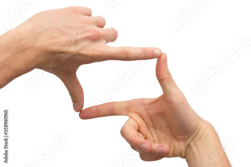 two hands making a frame from fingers