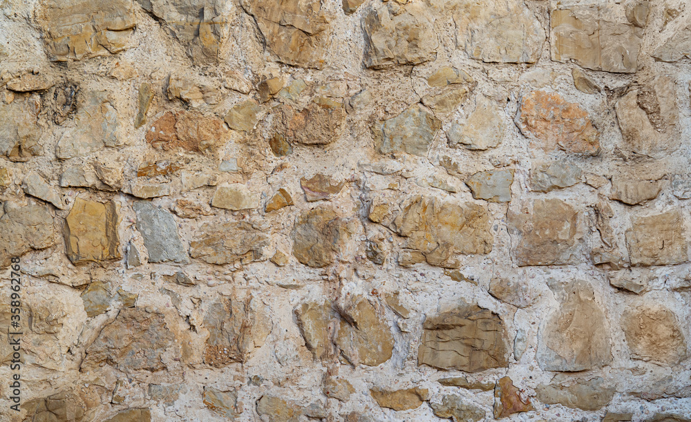 Old stone wall texture as background for design