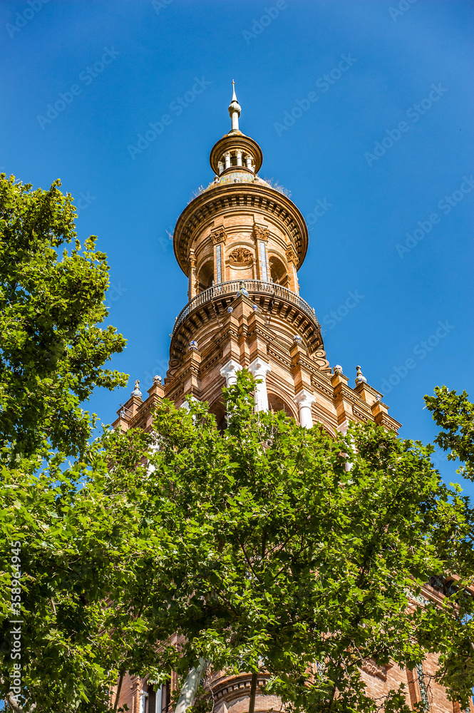 It's Tower of Central building at the Plaza de Espana in Seville, Andalusia, Spain. It's example of the Renaissance Revival style in Spanish architecture.