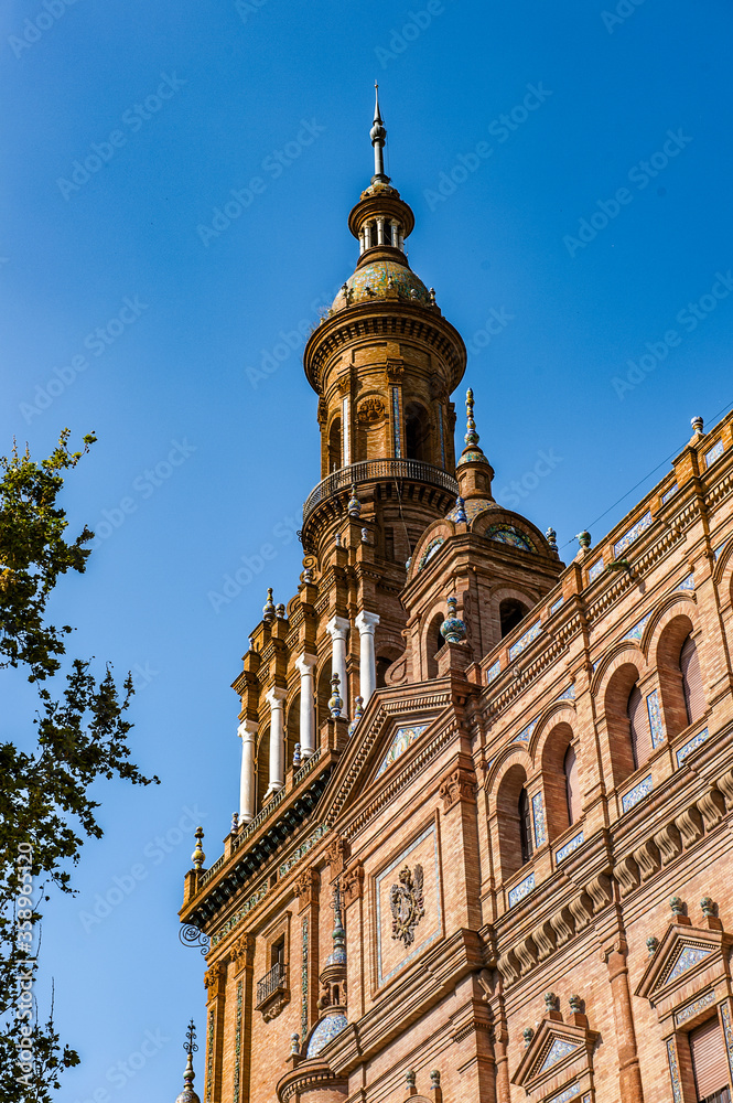 It's South tower of the Central building at the Plaza de Espana in Seville, Andalusia, Spain. It's example of the Renaissance Revival style in Spanish architecture.