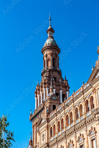 It's South tower of the Central building at the Plaza de Espana in Seville, Andalusia, Spain. It's example of the Renaissance Revival style in Spanish architecture.