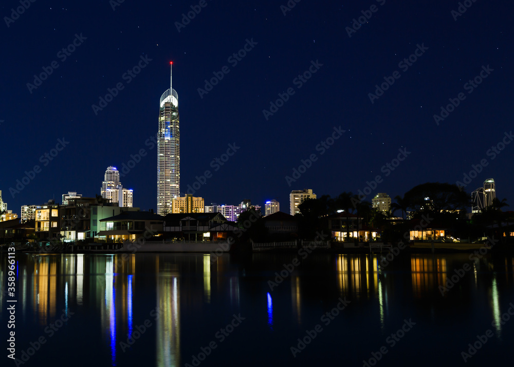 City lights of Surfers Paradise reflecting in the water.