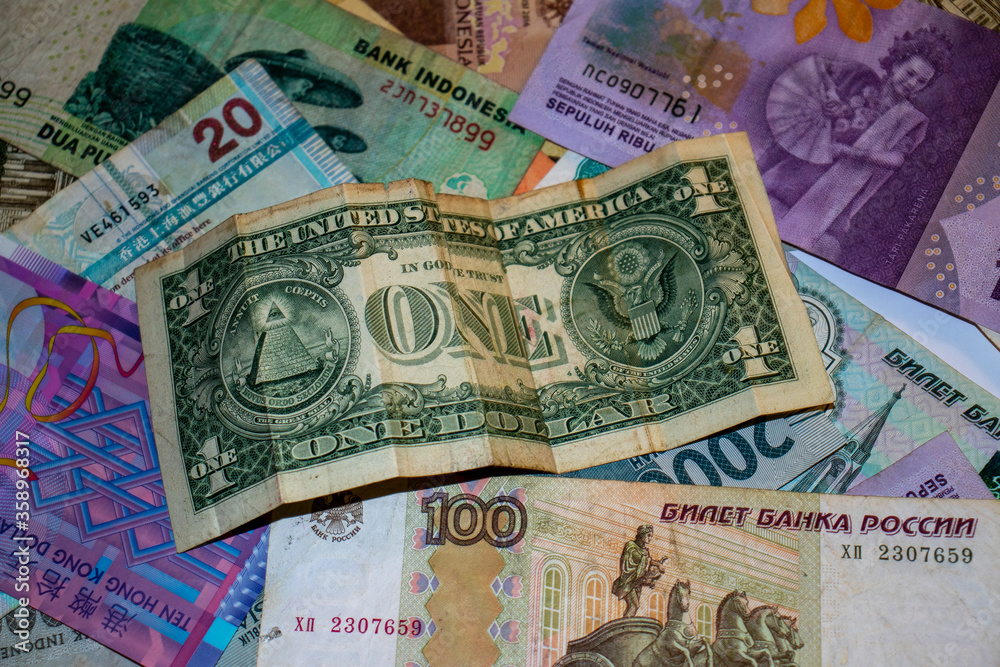 Closeup shot of different currencies. Good for presentations in finance, accounting or business development Closeup shot of different currencies. Good for presentations in finance, accounting or business development