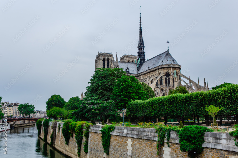 The eiffel tower on a cloudy day, in Paris, France, a low angle shot.