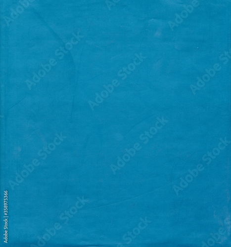 Old blue paper texture. Rough faded surface. Blank retro page. Empty place for text. Perfect for background and vintage style design.