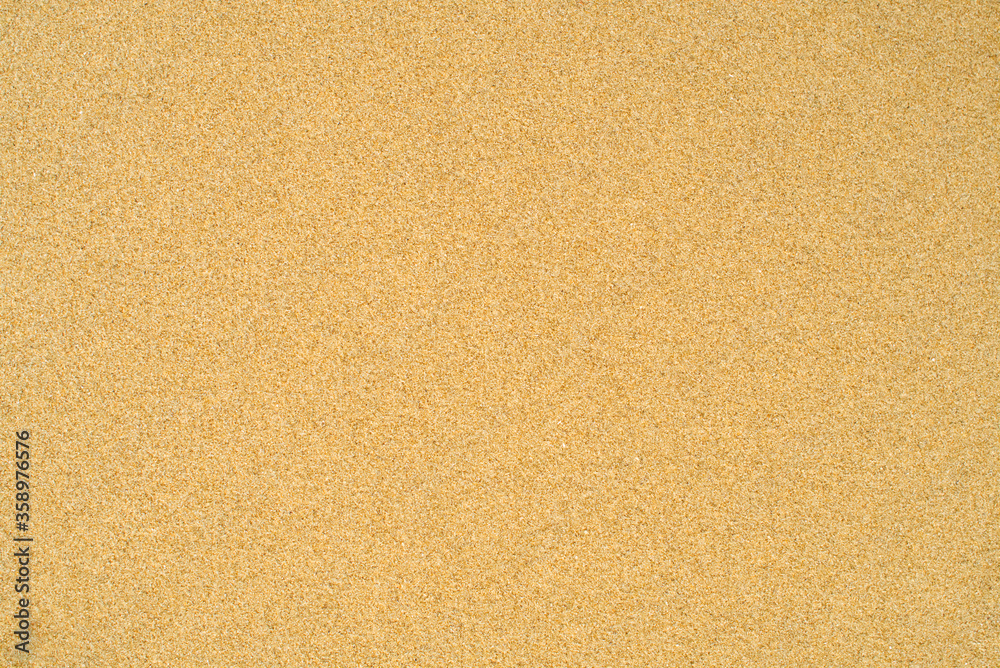 Fototapeta premium Fine clean beach sand, seamless texture background wallpaper, Natural concept design, summer sunset mood 