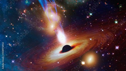 Quasar with jets in the deep space. Elements of this image furnished by NASA photo