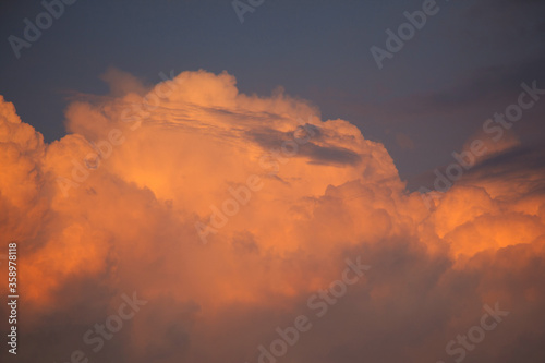 landscape with sunset and cumulus clouds