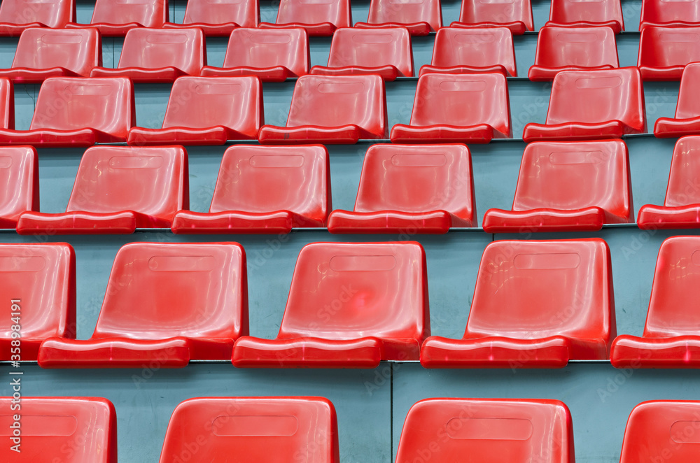 Empty red stadium seats Empty red stadium seats