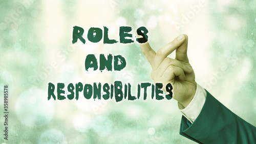 Conceptual hand writing showing Roles And Responsibilities. Concept meaning Business functions and professional duties