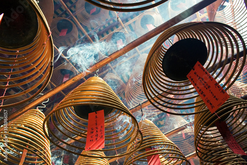 Burning incense coils inside Man Mo Temple, Sheung Wan, Hong Kong