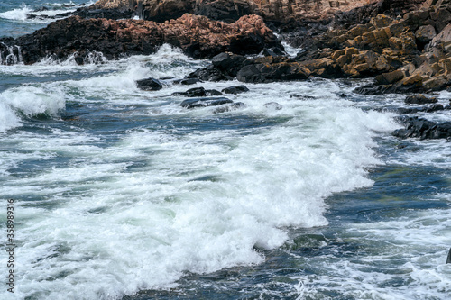 Wild rocky sea coast on Kullen peninsula in western Sweden, Skane