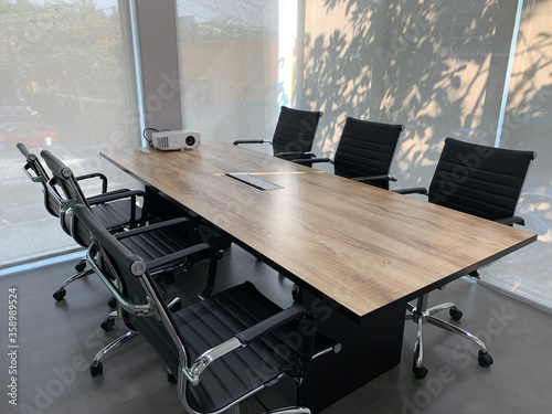 An empty business meeting room in modern office. Interior of meeting room. Home office, Classroom and Co-working space.