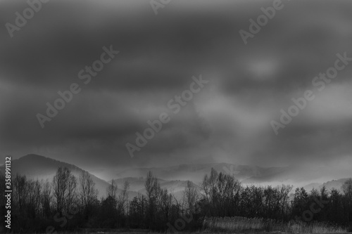 Winter landscape with mountains black and white