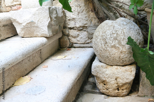 Stone elements of garden furniture of a medieval palace in southern Italy