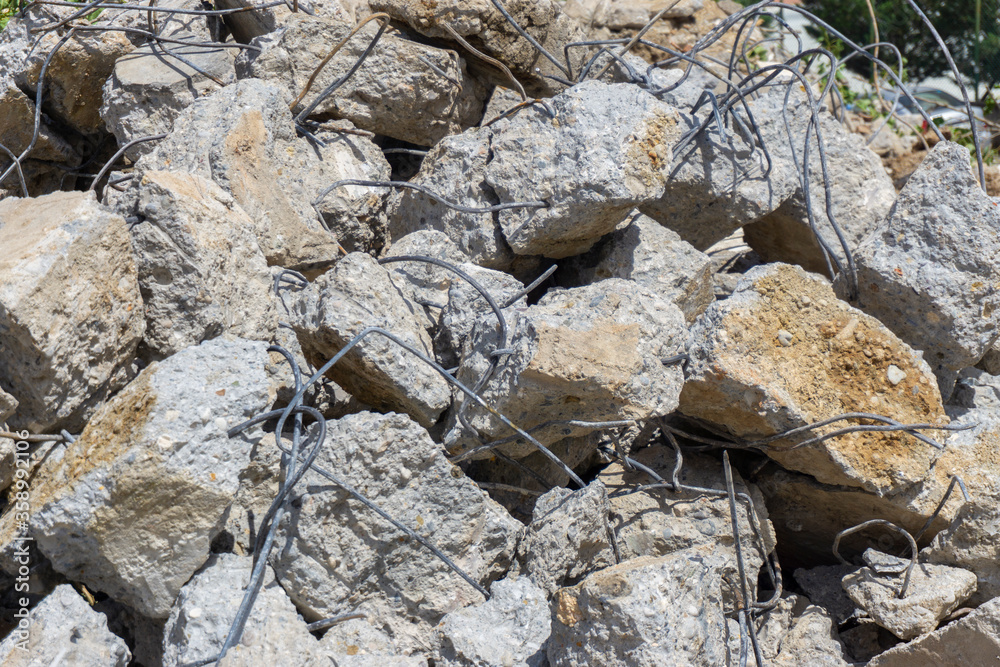 Pile of rubble from a dismantled building at a demolition site. Pile of rubble from a dismantled building at a demolition site.