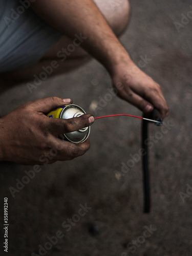 Auto mechanic working on spare parts for a car