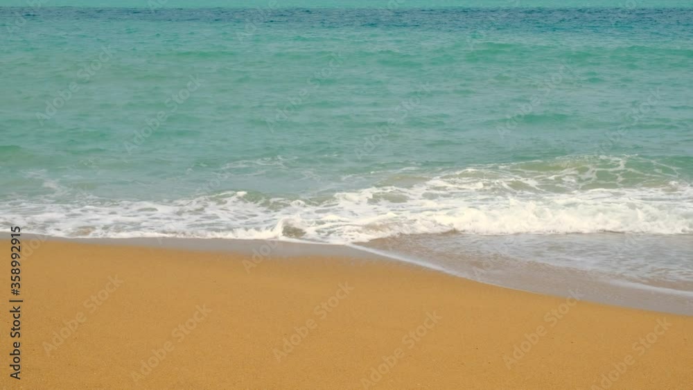 Phuket sea beach, close view of beach and waves by hand held ,on summer, Thailand Phuket sea beach, close view of beach and waves by hand held ,on summer, Thailand