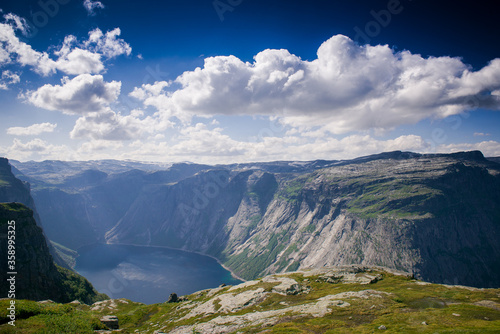 panorama of the fjord in Norway. view of the fjord. Two rocks over a cliff. Mountain lake and stone cliffs. Norwegian view from the mountain