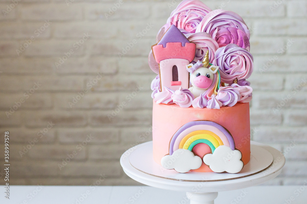 Cute pink birthday cake for a little girl with fondant unicorn ...