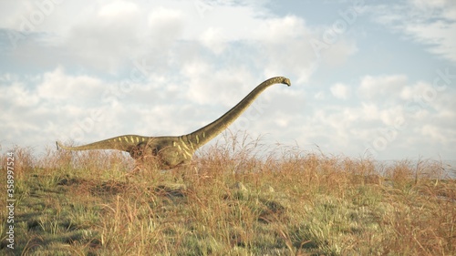 3d rendering of the walking and grazing mamenchisaurus dinosaur © Kostyantyn Ivanyshen