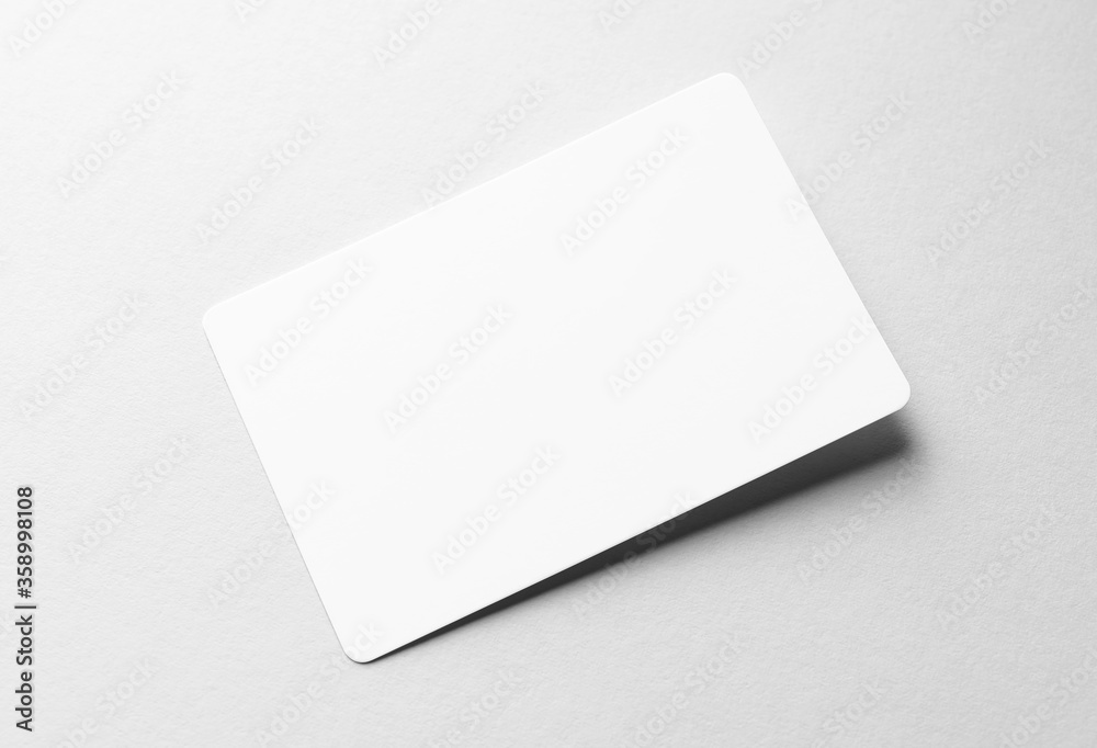Photo of mockup business card on white background. Template for branding identity and company name. Photo of mockup business card on white background. Template for branding identity and company name.