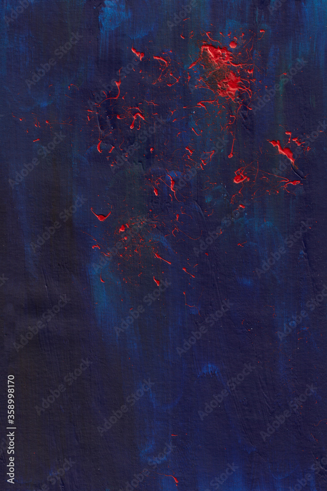 spots of red color are painted on a blue textural background, splashes of paint