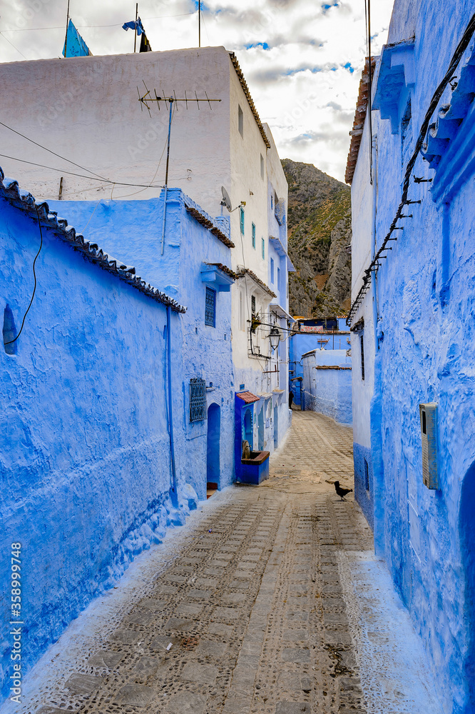 It's Blue walls street of Chefchaouen, Morocco. It's Blue walls street of Chefchaouen, Morocco.
