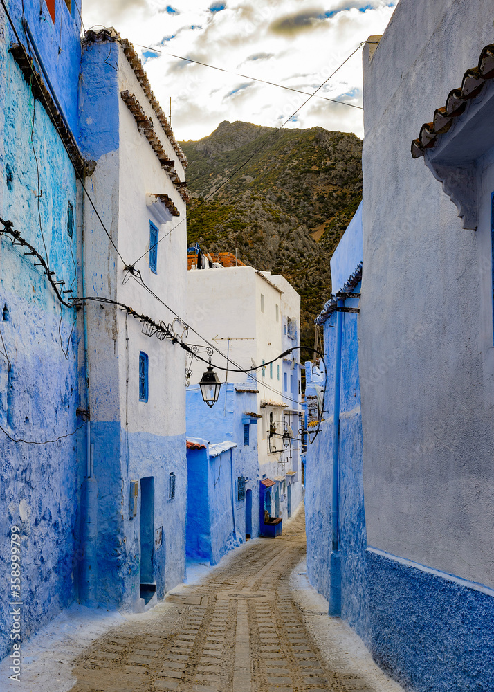 It's Blue walls street of Chefchaouen, Morocco. It's Blue walls street of Chefchaouen, Morocco.