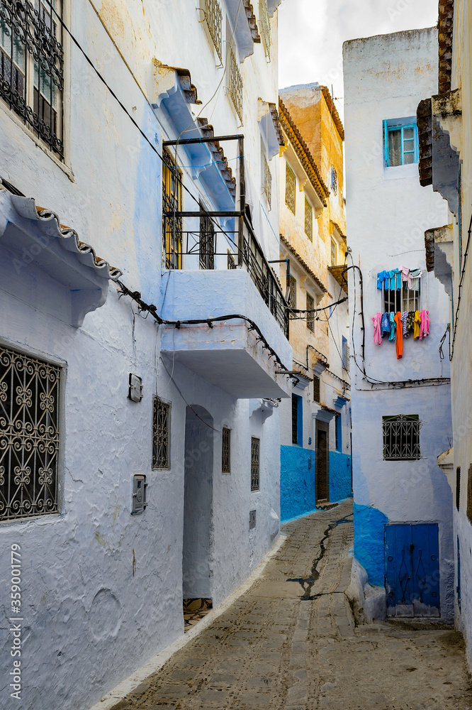It's Blue wall of Chefchaouen, small town in northwest Morocco famous by its blue buildings It's Blue wall of Chefchaouen, small town in northwest Morocco famous by its blue buildings