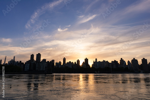 Beautiful Sunset over the Roosevelt Island and Upper East Side Skyline along the East River in New York City