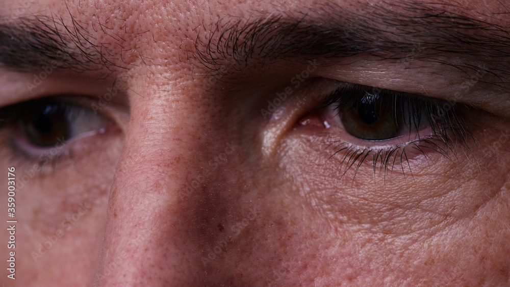 close up of a man eye close up of a man eye