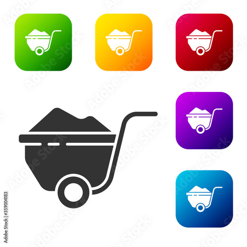 Black Wheelbarrow with dirt icon isolated on white background. Tool equipment. Agriculture cart wheel farm. Set icons in color square buttons. Vector Illustration.