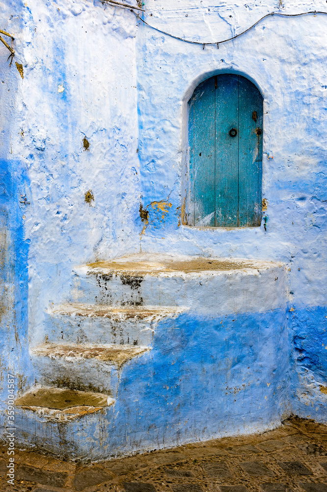 It's Blue painted walls of the houses in Chefchaouen, small town in northwest Morocco famous by its blue buildings