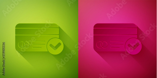 Paper cut Credit card icon isolated on green and pink background. Online payment. Cash withdrawal. Financial operations. Shopping sign. Paper art style. Vector Illustration.