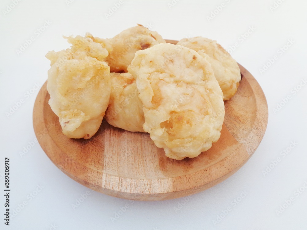 Fried fermented cassava, Indonesian famous street food or street snack. Indonesian called tape goreng, rondo royal or fried peuyeum. Sweet, creamy, crunchy outside, little oily and delicious.
