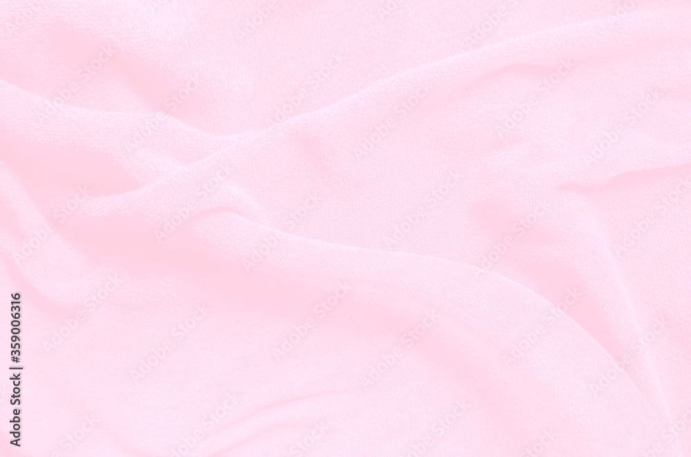 Fototapeta premium Pink pastel soft cotton towel from natural, texture for background, close up photo.