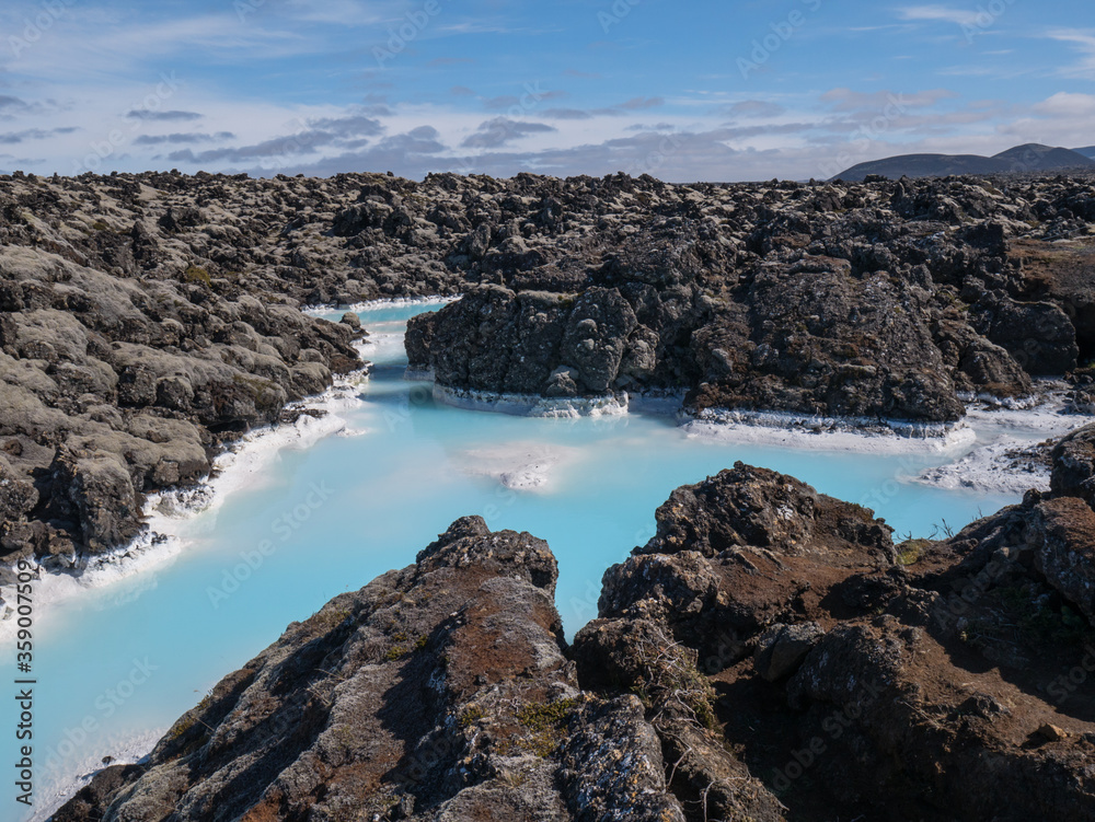 Blue lagoon water in lava field landscape, natural geothermal spa area near Reykjavik, Iceland